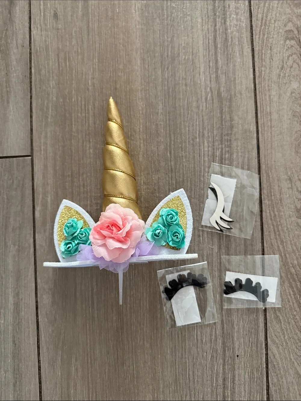 Gold Unicorn Horn Cake Topper with Pink and Teal Flowers